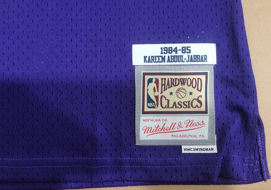 LA Lakers Kareem Abdul-Jabbar 1984/85 Purple Jersey By Mitchell & Ness